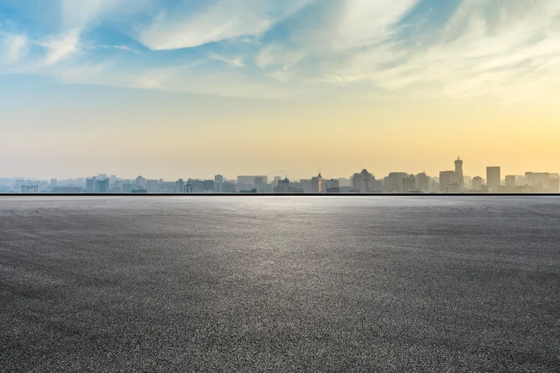 An open highway at sunrise for an early-morning airport transfer