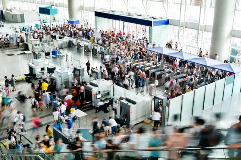 A busy airport terminal during peak travel