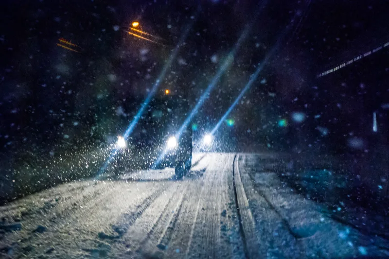A car on a snowy winter road